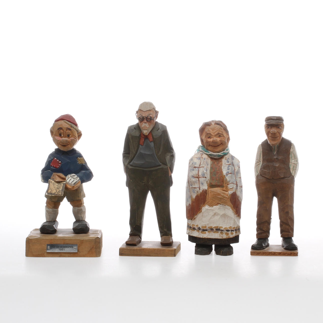 FIGURINER 4 st, träskurna, delvis signerade, 1900-tal.