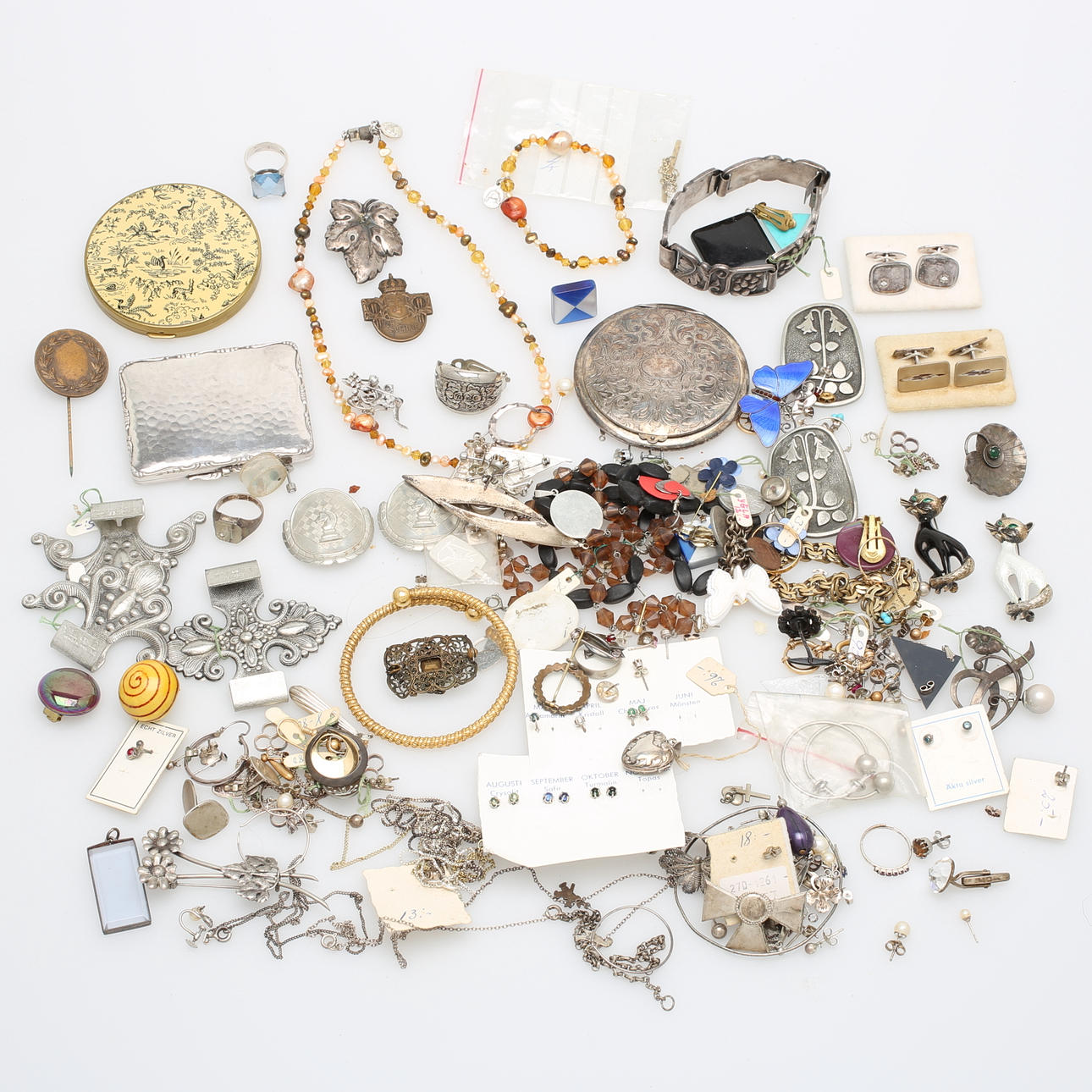 SMYCKEN med mera, bland annat silver.