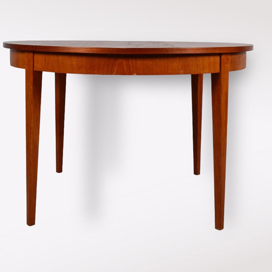 A teak dining table, 1960s/70s.