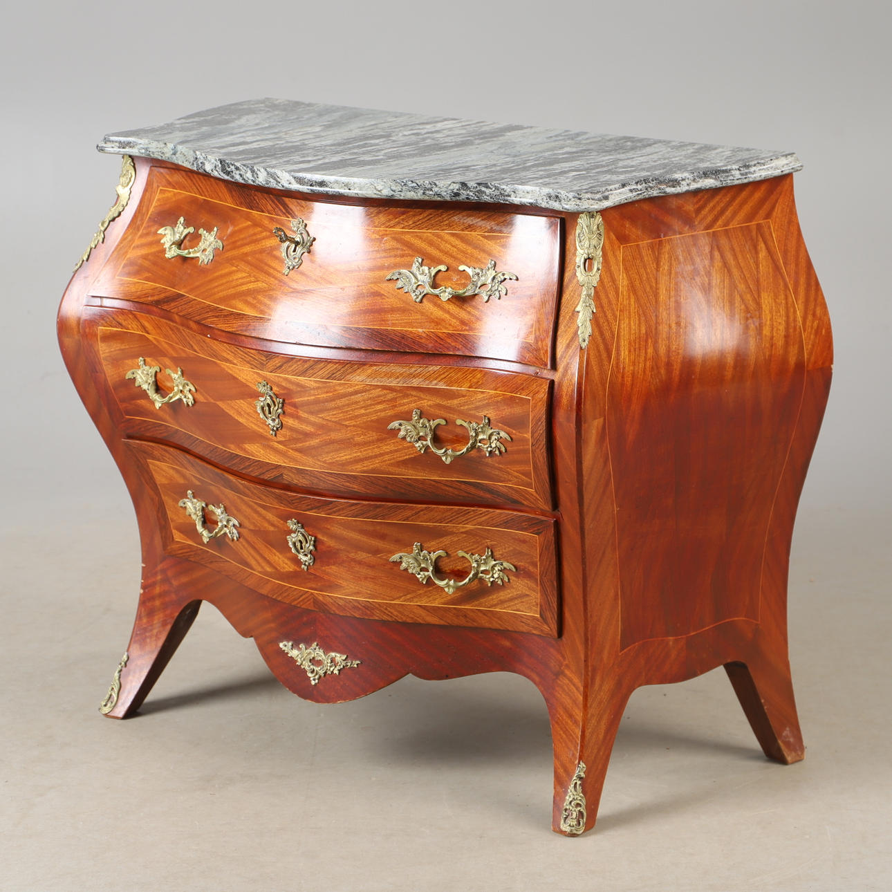 Chest of drawers, 3-drawer, mahogany with intarsia, bronzes and stone top, rococo style.