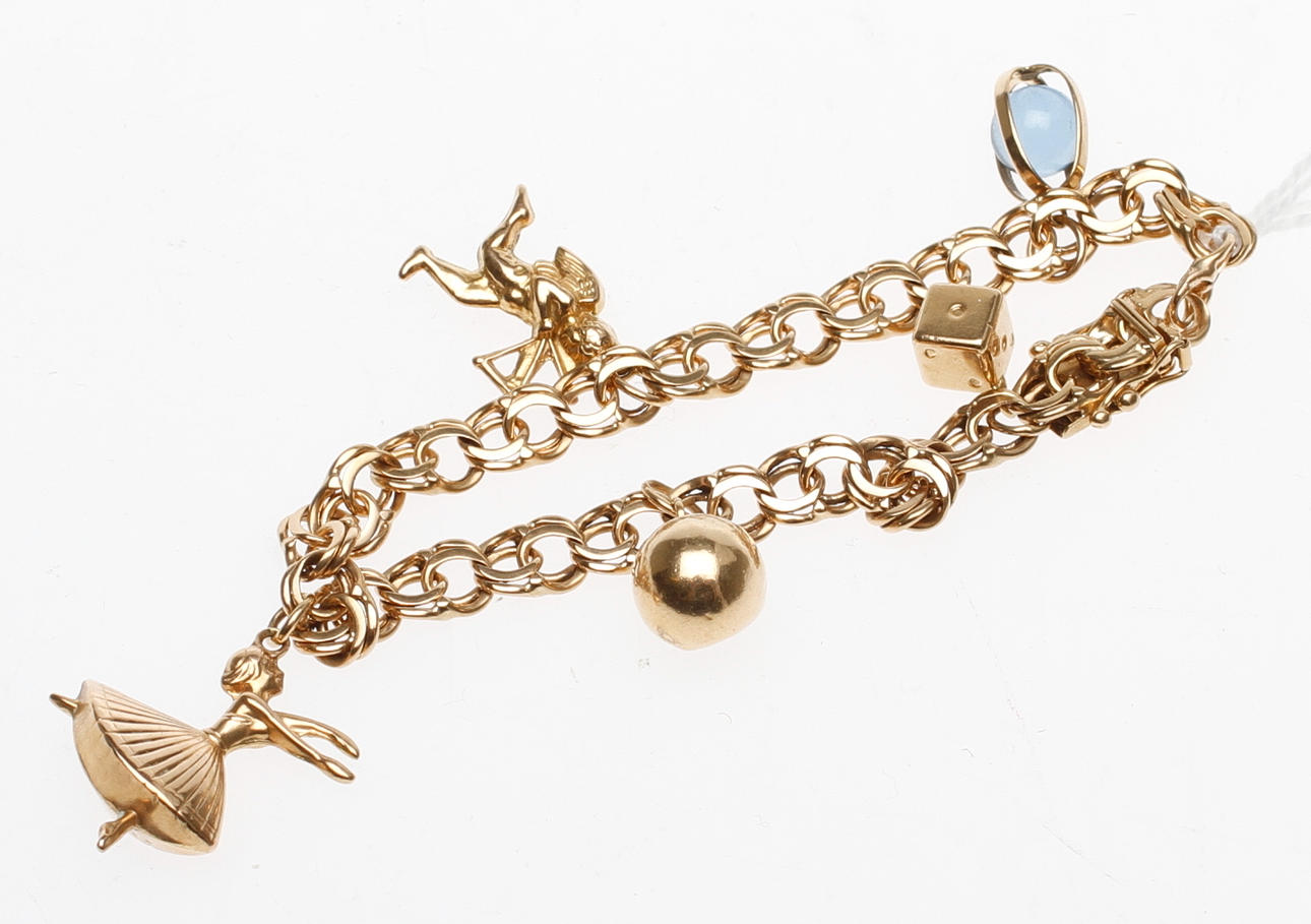 ARMBAND med BERLOCKER, 18k guld, vikt ca 18,5 gram.