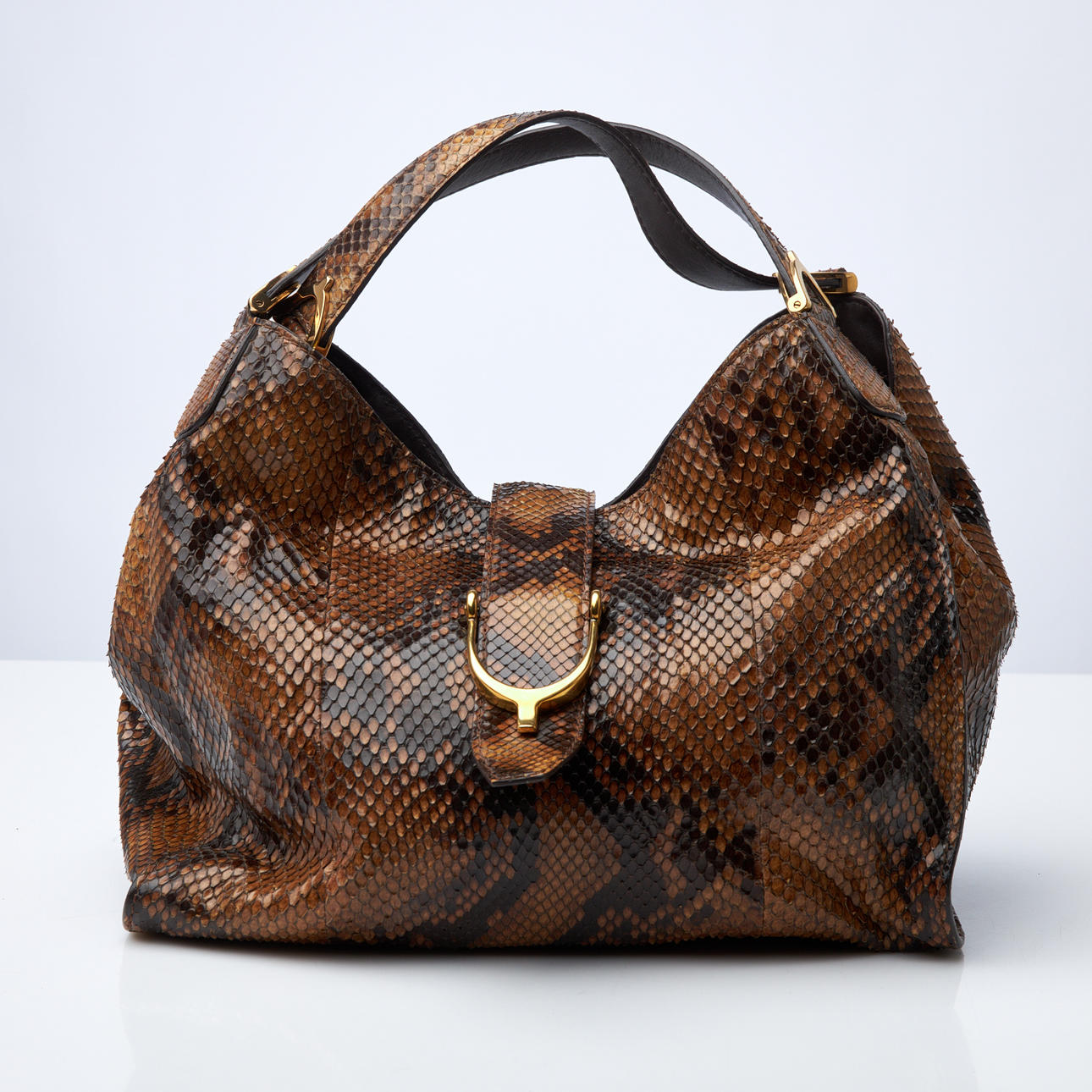 GUCCI. Handbag, Python Sac à main, leather interior, three compartments, marked Gucci made in Italy.