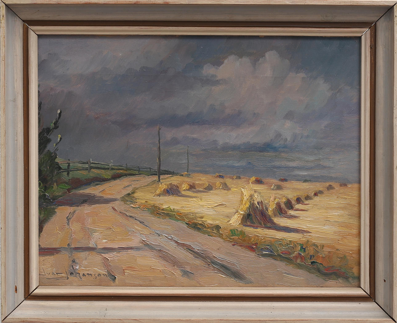 IVAR JOHANSON. Landsväg vid äng. Olja på duk, signerad.