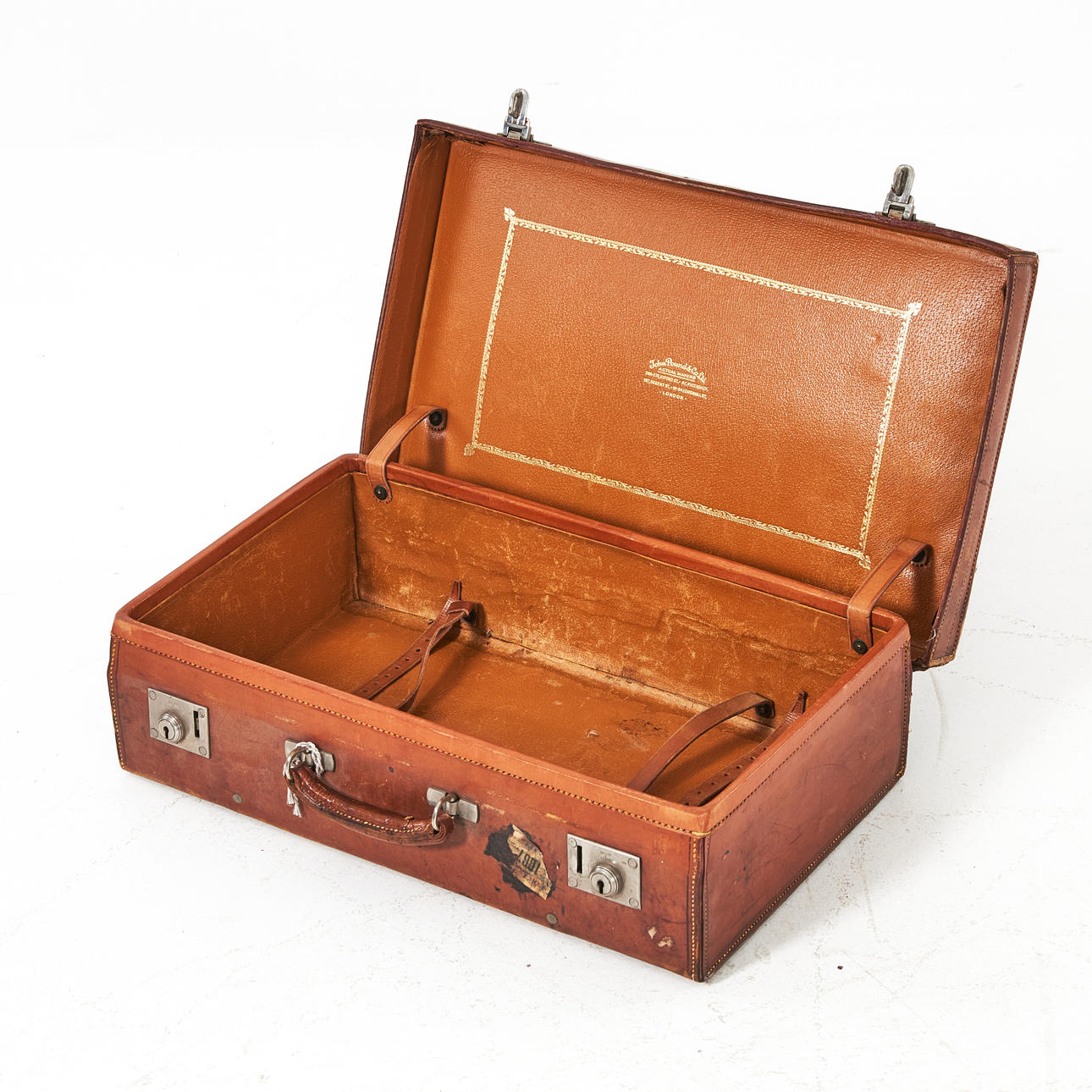 JOHN POUND & CO. suitcase, circa 1900, leather.