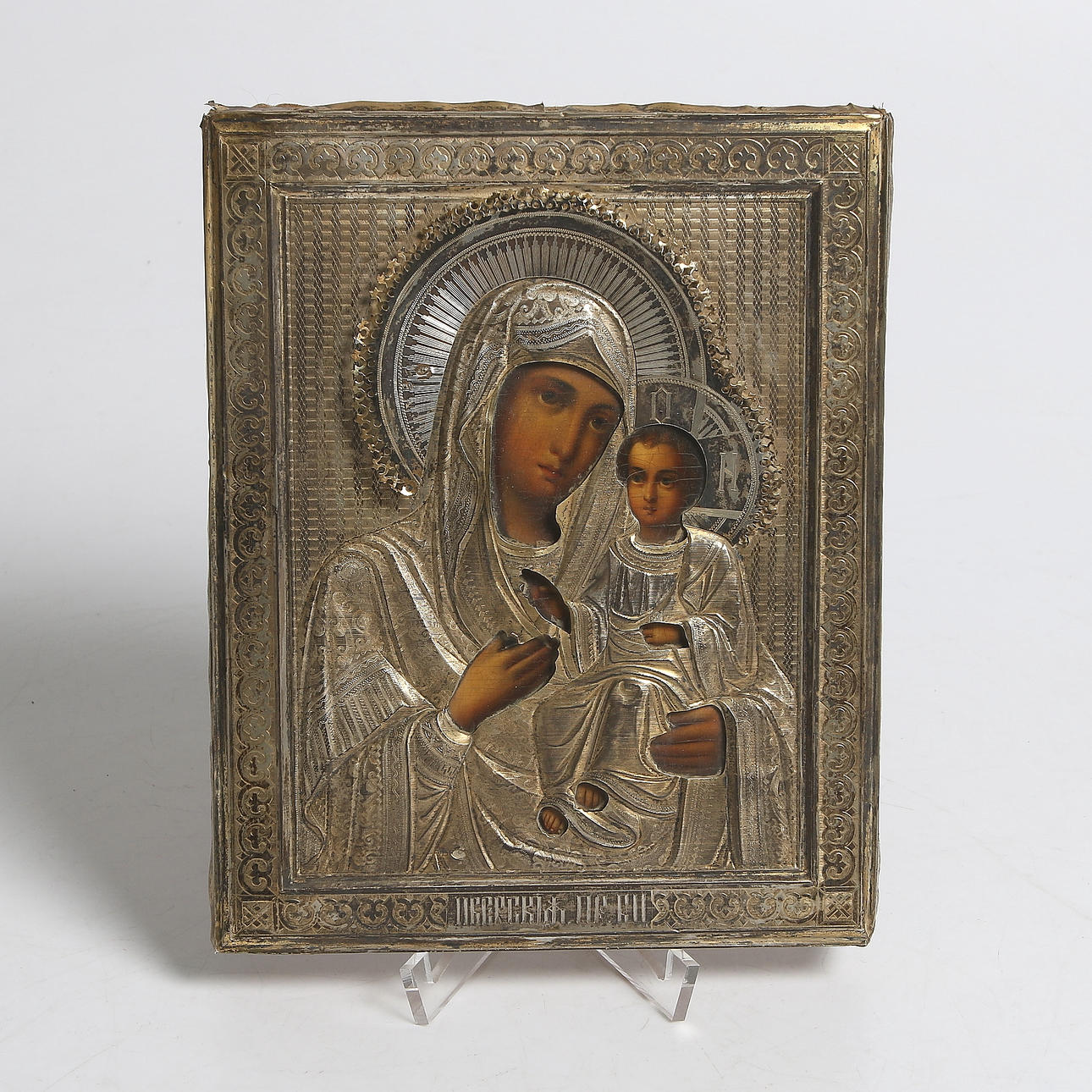 IKON, olja på pannå, risa av förgyllt silver. Ryssland. 1800-tal.