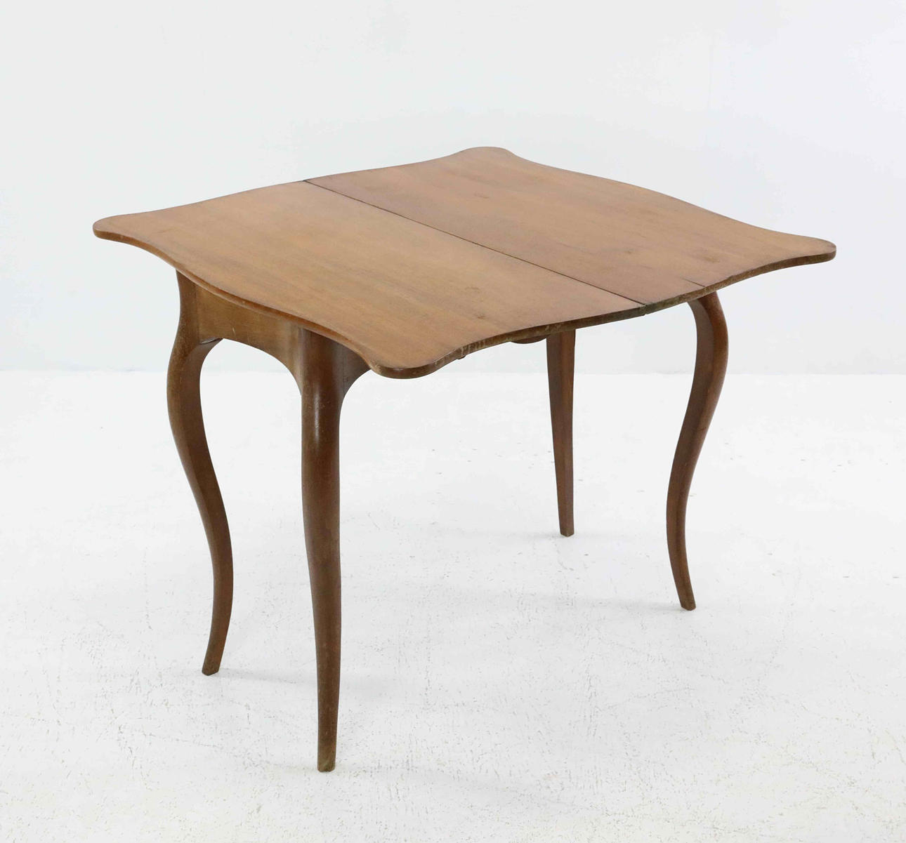 A 20th century Mahogany Rococo gaming table.