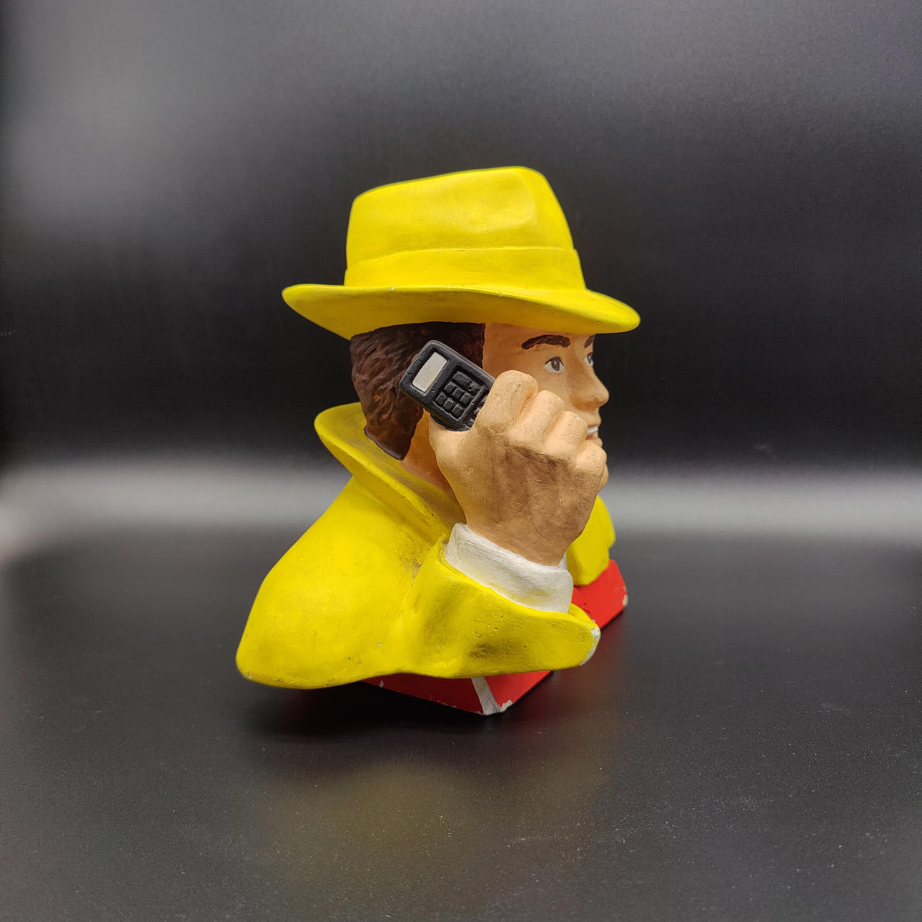 SIEMENS CERAMIC ADVERTISING FIGURE FROM THE 90S: MAN IN A YELLOW JACKET ...