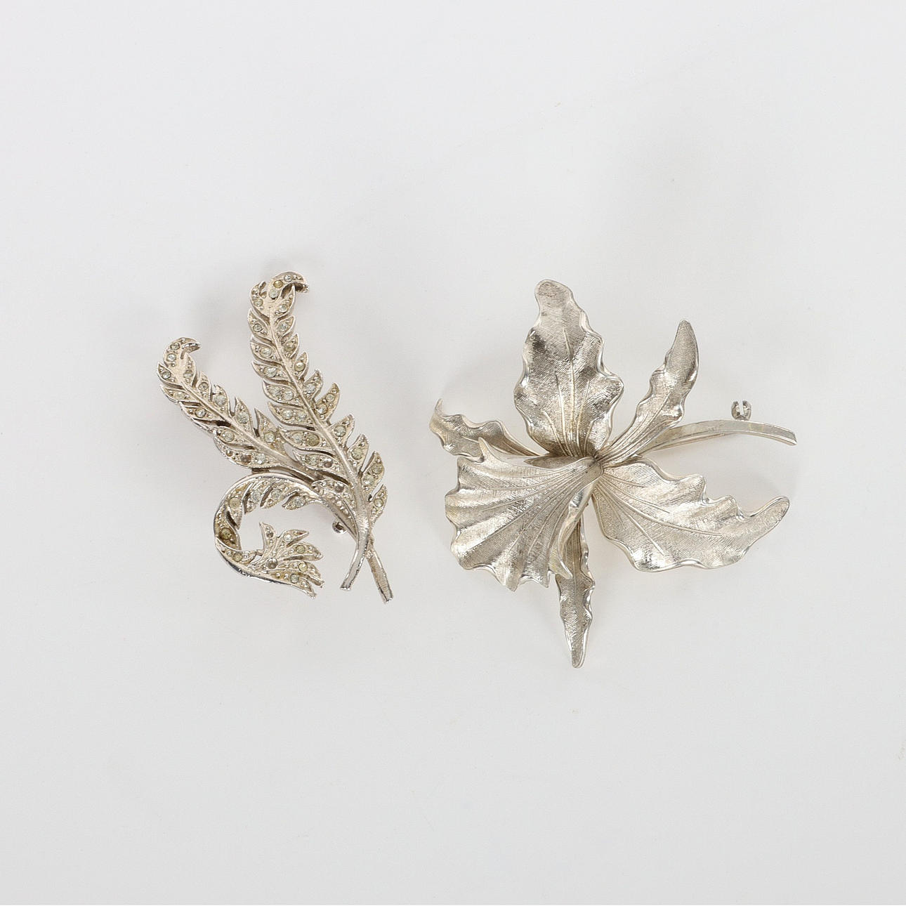 BROOCHES, 2 pcs, silver, mid 20th century.
