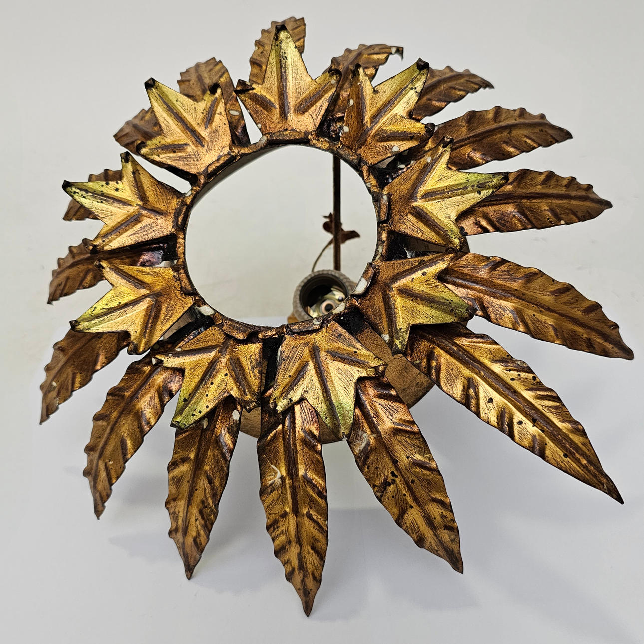 SUN-SHAPED LAMP-WALL LAMP IN METAL.