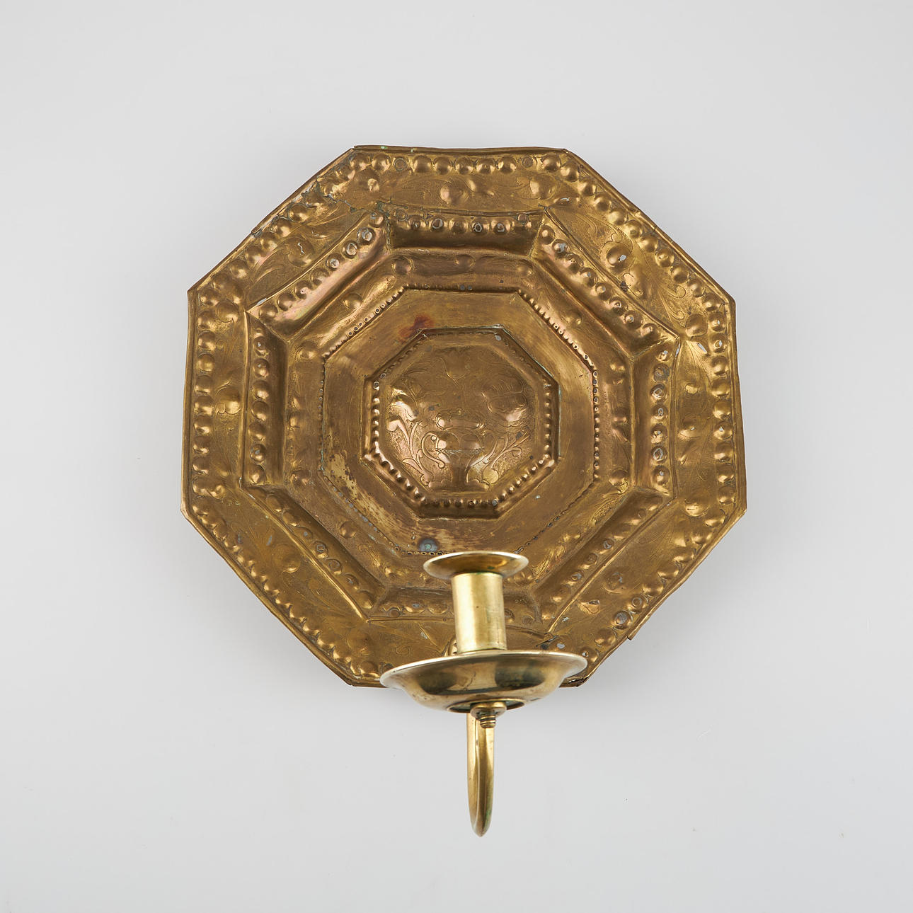 A 18th-century brass candlestick, baroque.