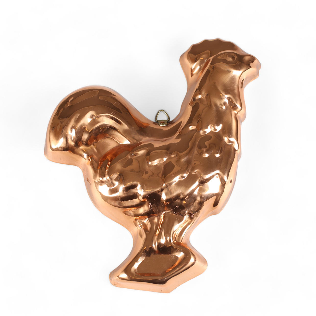 Una forma, cobre, con forma de gallo, Portugal.