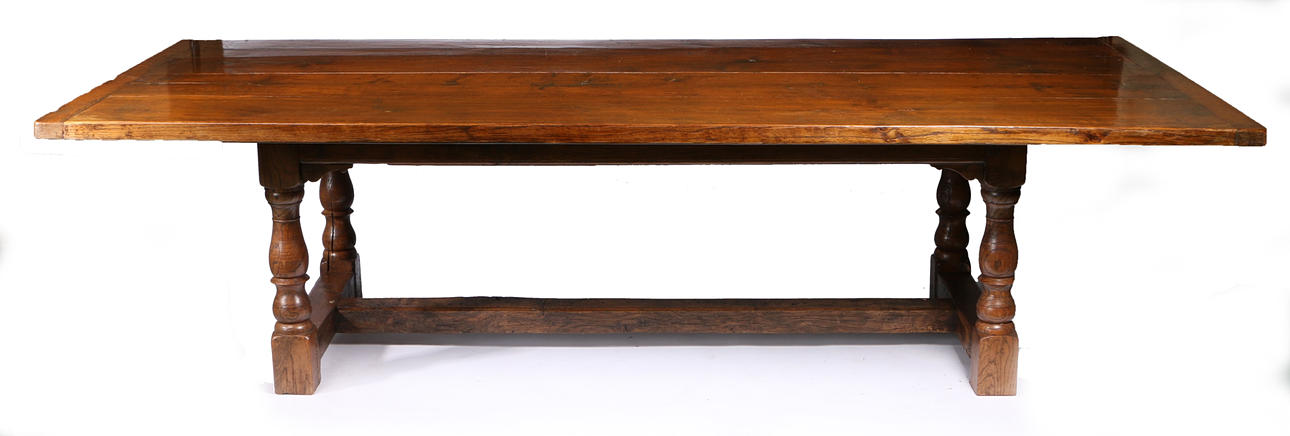 A SUBSTANTIAL OAK REFECTORY DINING TABLE.