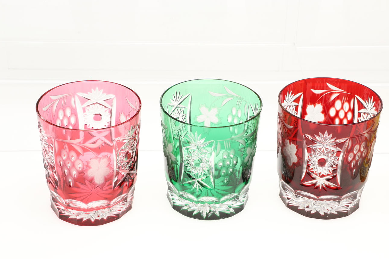 ELEVEN LARGE COLOURED CUT GLASS TUMBLERS. Glass Tableware