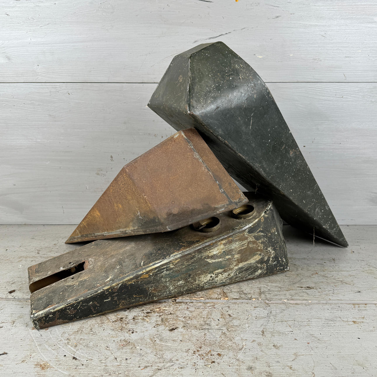 A set of three flat tanks, 1920's.