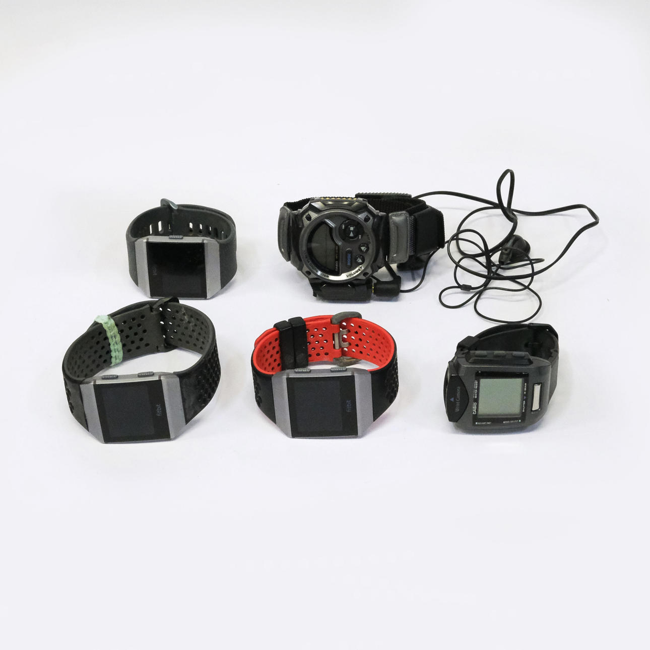 FIVE WRISTWATCHES, FITBIT AND CASIO.