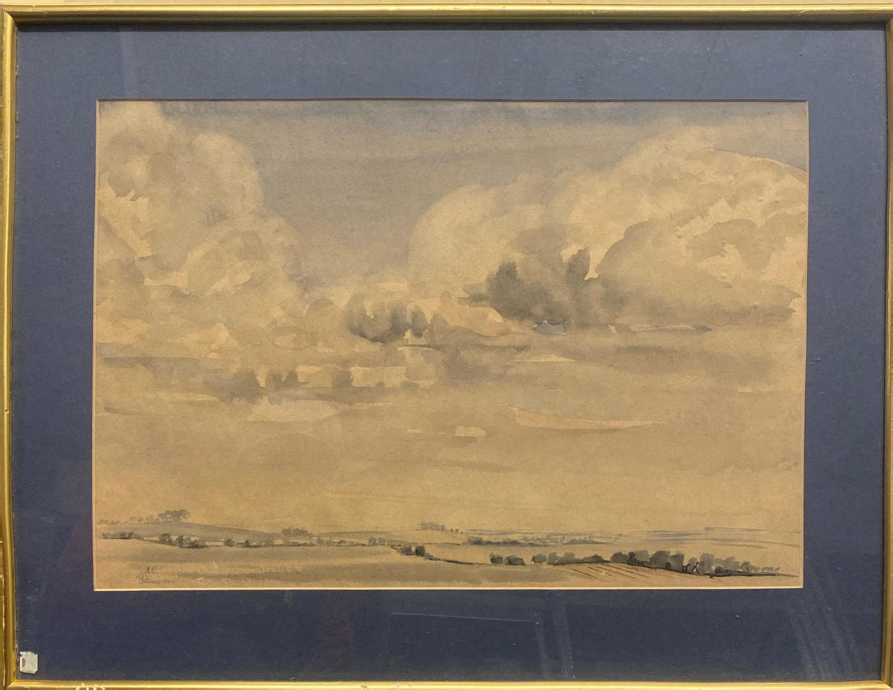 AKVAREL AF EN LANDLIG SCENE.