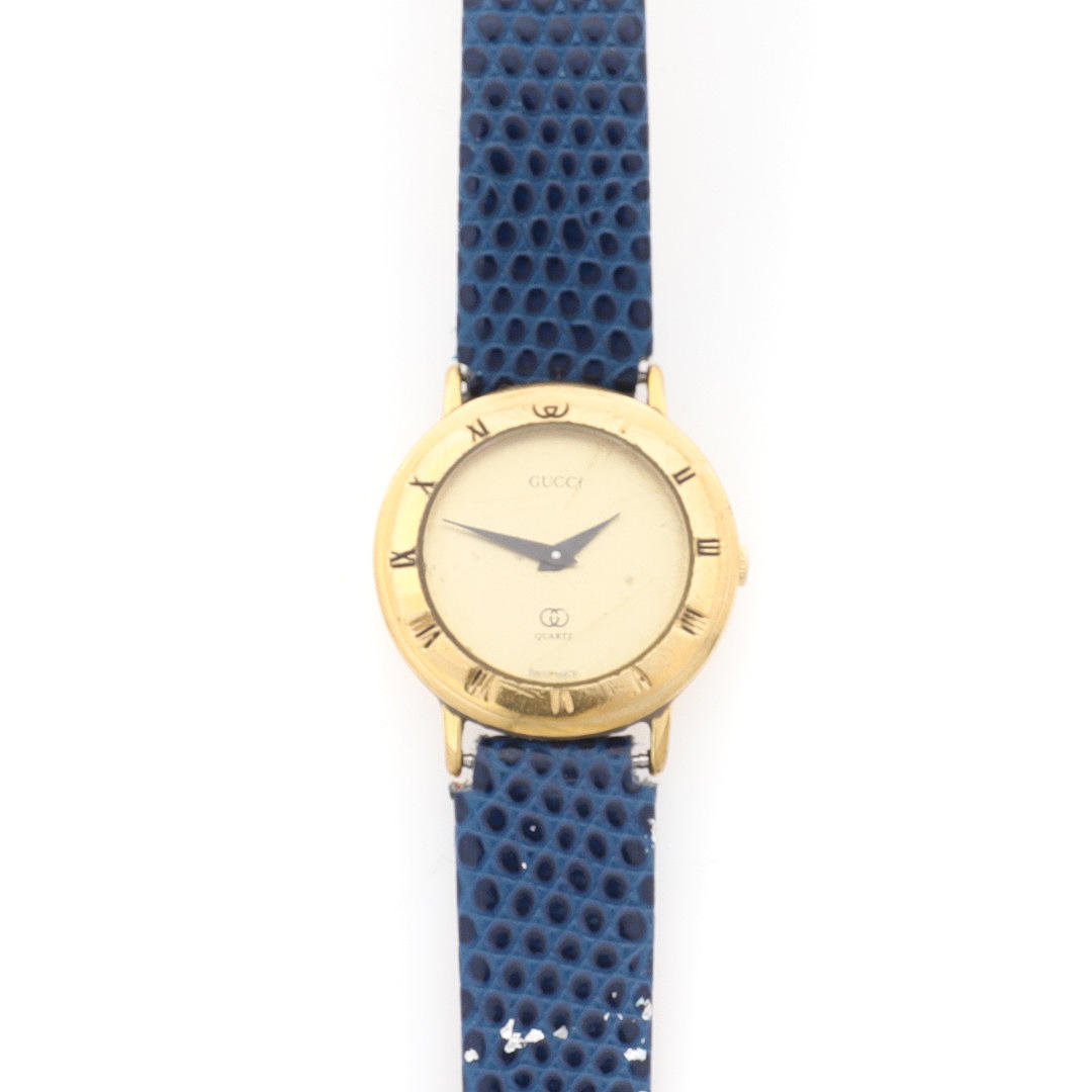 GUCCI: A LADIES CIRCULAR QUARTZ WRIST WATCH.