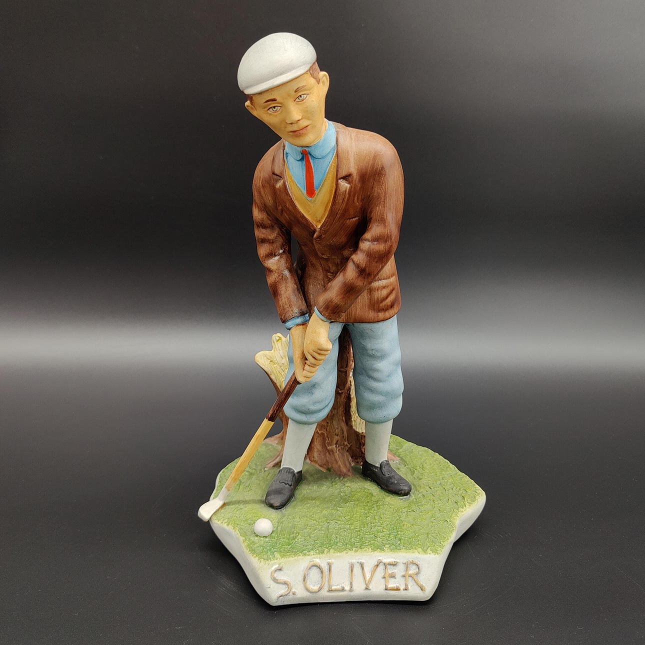 S. OLIVER KERAMIK WERBEFIGUR: GOLFER MIT PUTTER.