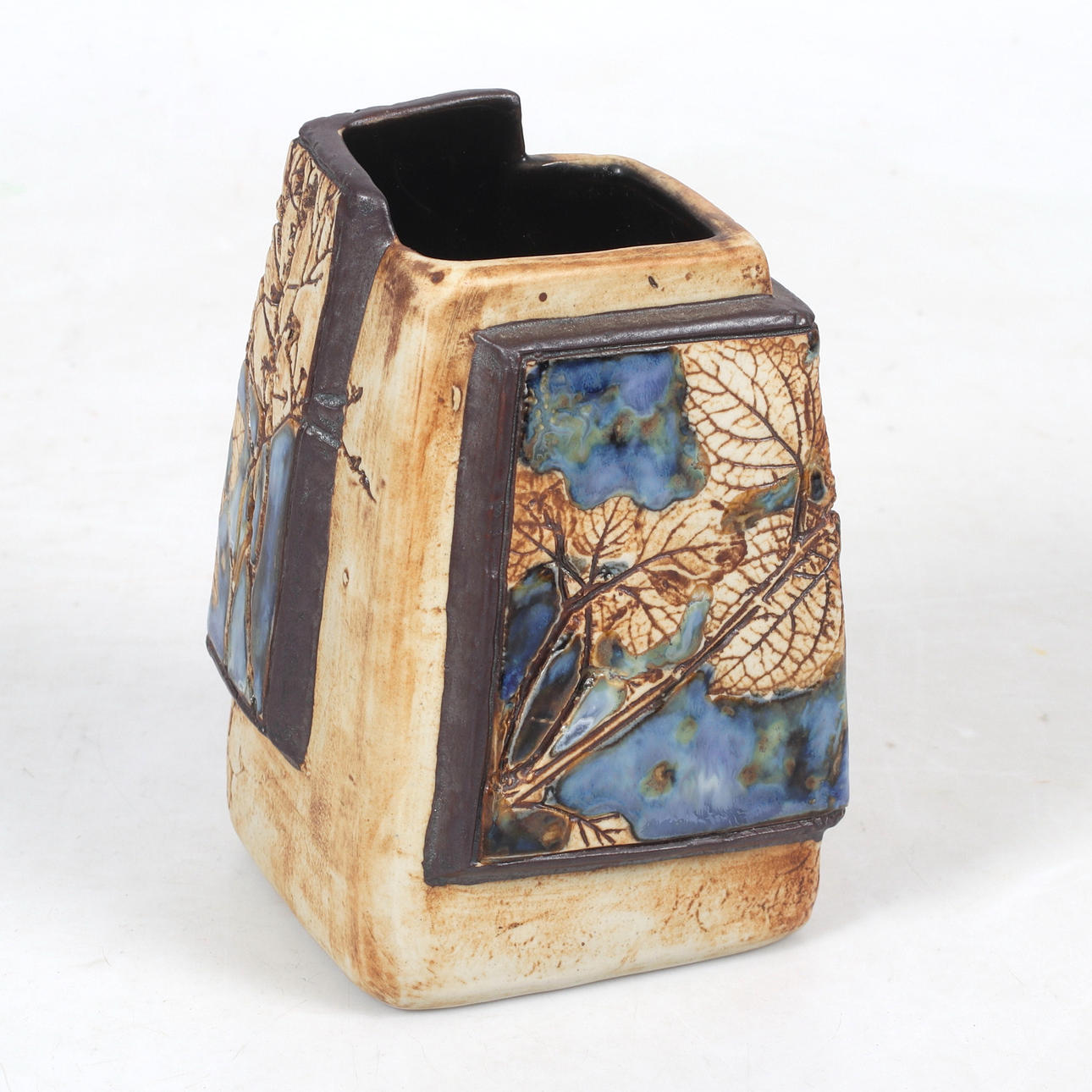 A ceramic vase, Tenmoku glaze, Malaysia.