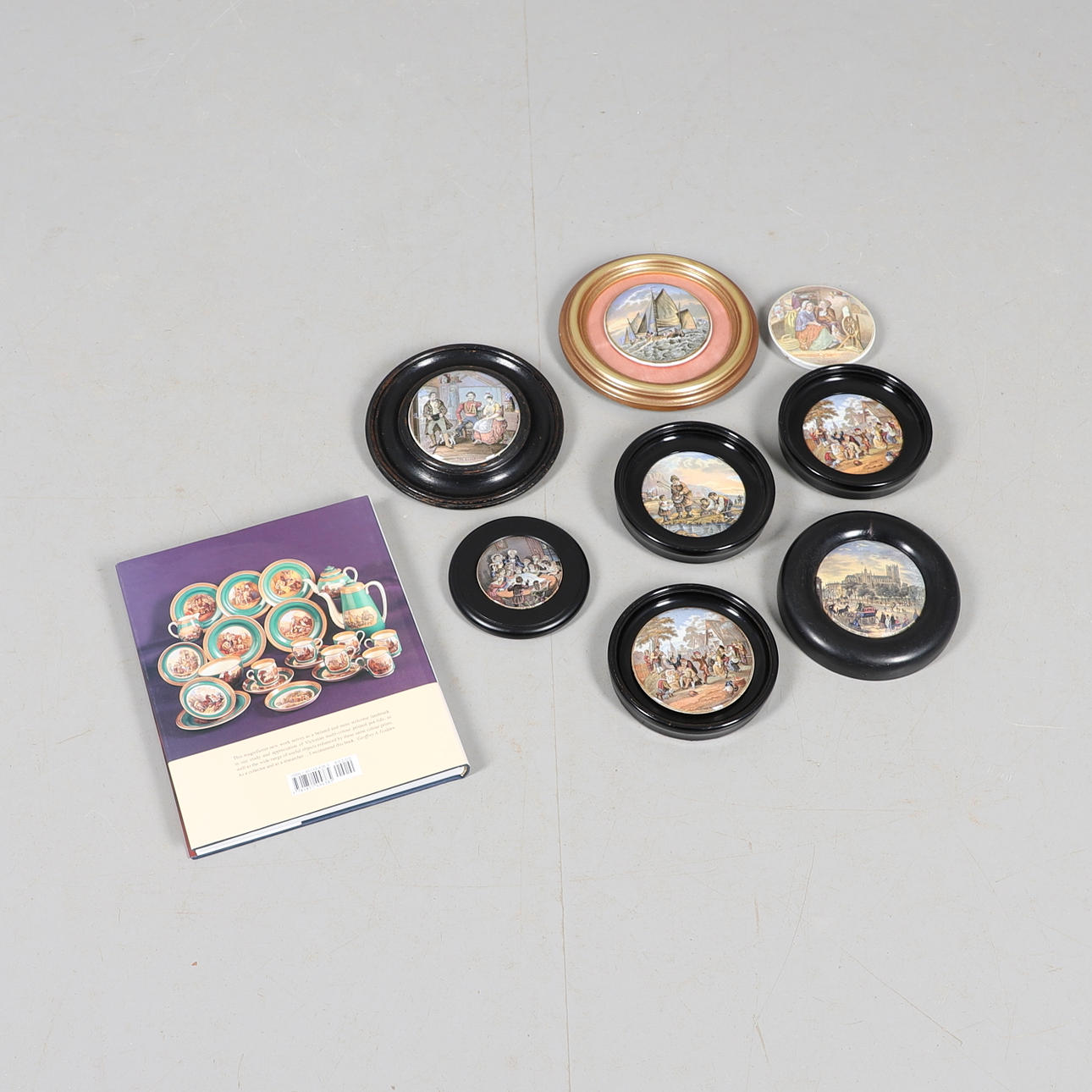 COLLECTION OF PRATTWARE POT LIDS & REFERENCE BOOK.