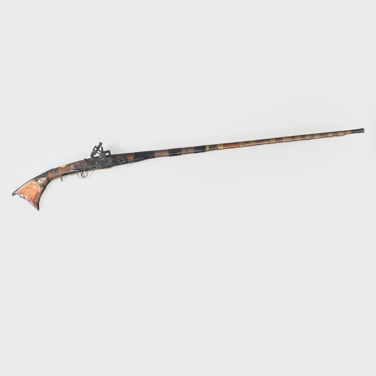 A 19th century flintlock rifle, oriental.