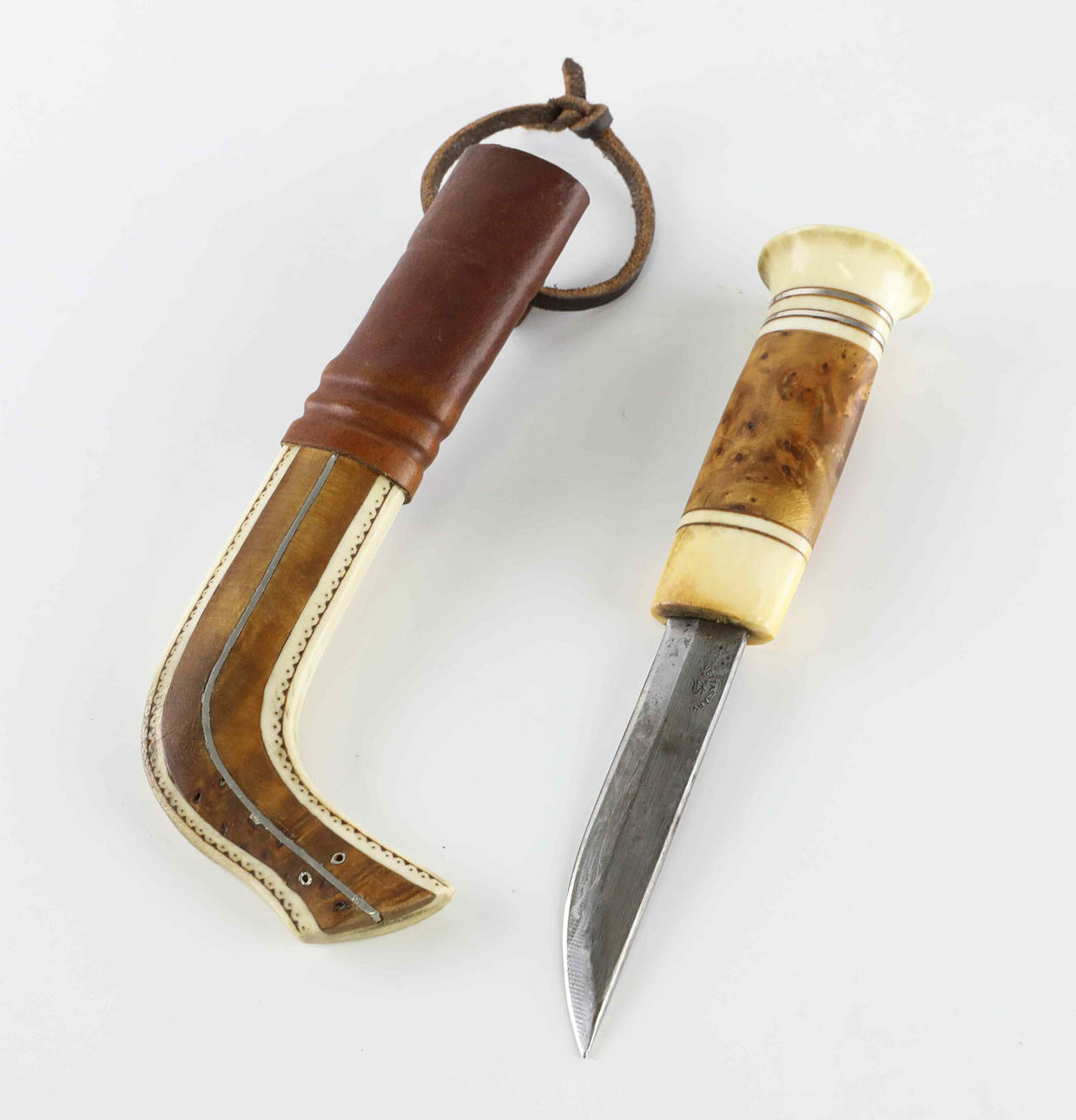 PER ERIK NILSSON. Knife, half horn, signed, Luleå.