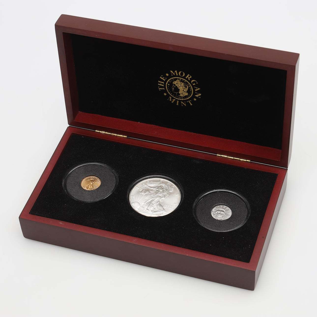 MØNT 3 stk USA, guld, sølv og platin.