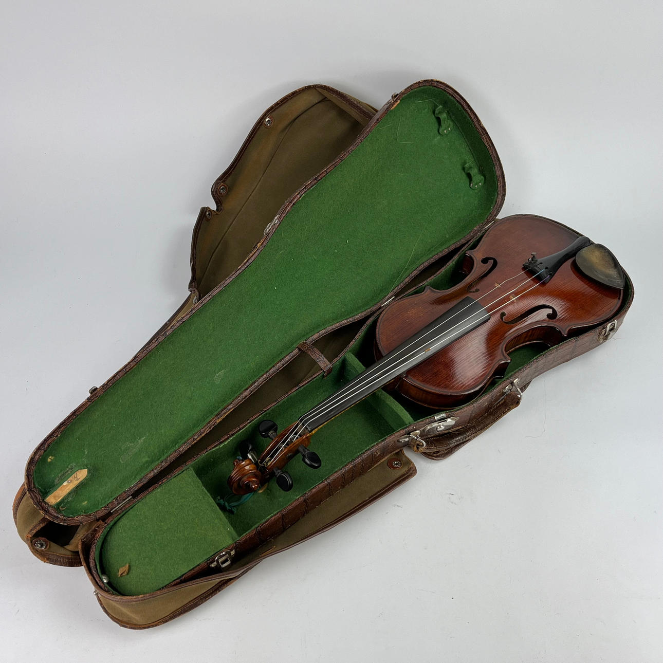 VIOLIN, CASE AND STRINGS, 3 pcs. Violin indistinctly signed and dated 1930.
