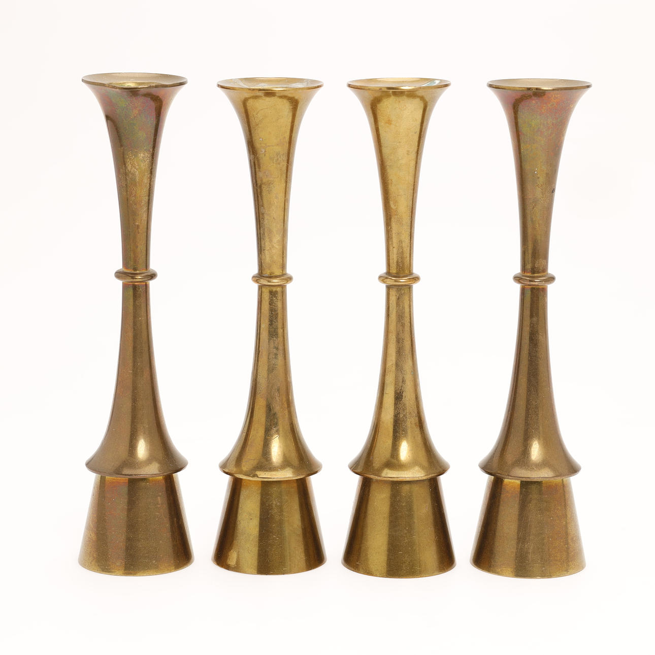 DANSK DESIGN. 4 pcs. brass candlesticks, Denmark, 1960-70s, (4).