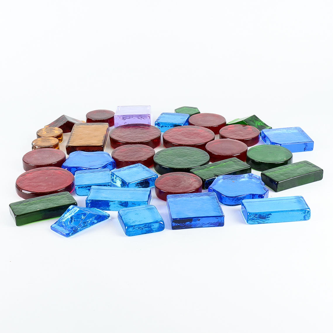 GLASBLÖCKE in verschiedenen Farben und Formen.