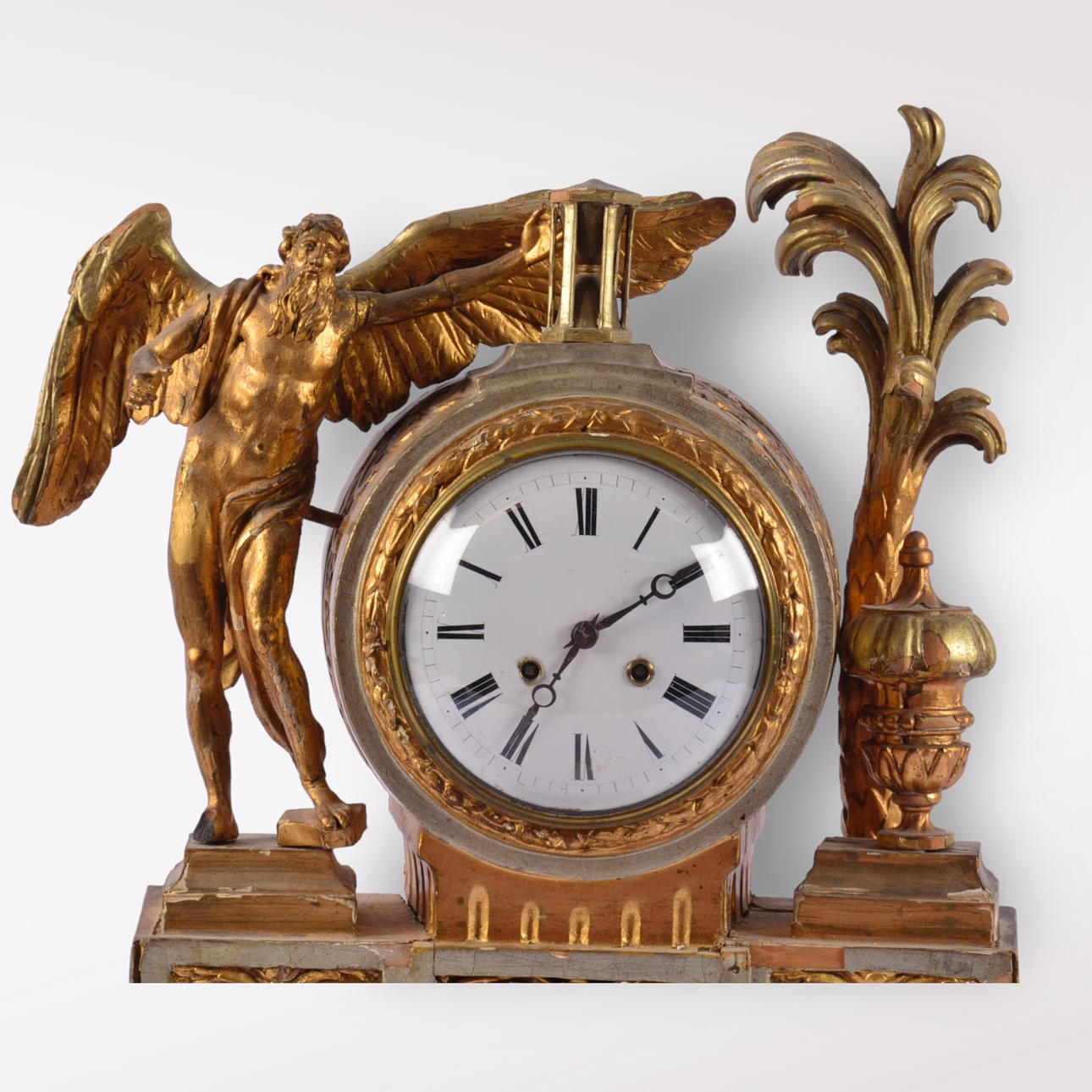 A gilded wooden table clock, 18th century.