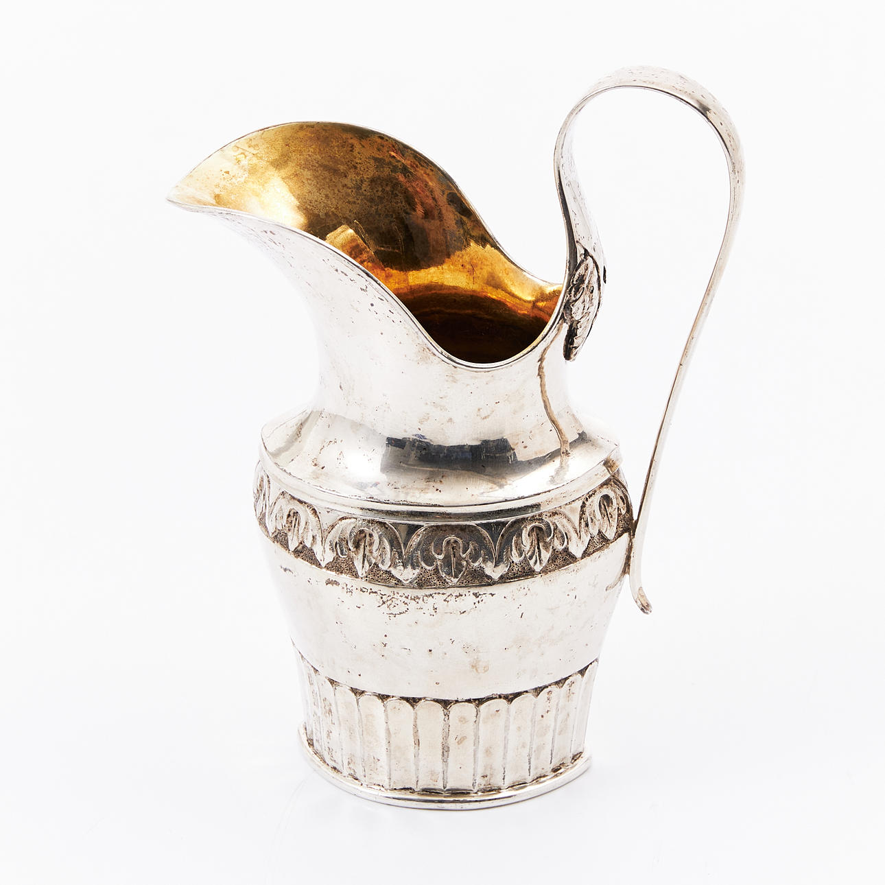 A silver cream jug, circa 1850, marked E:Schvtz.