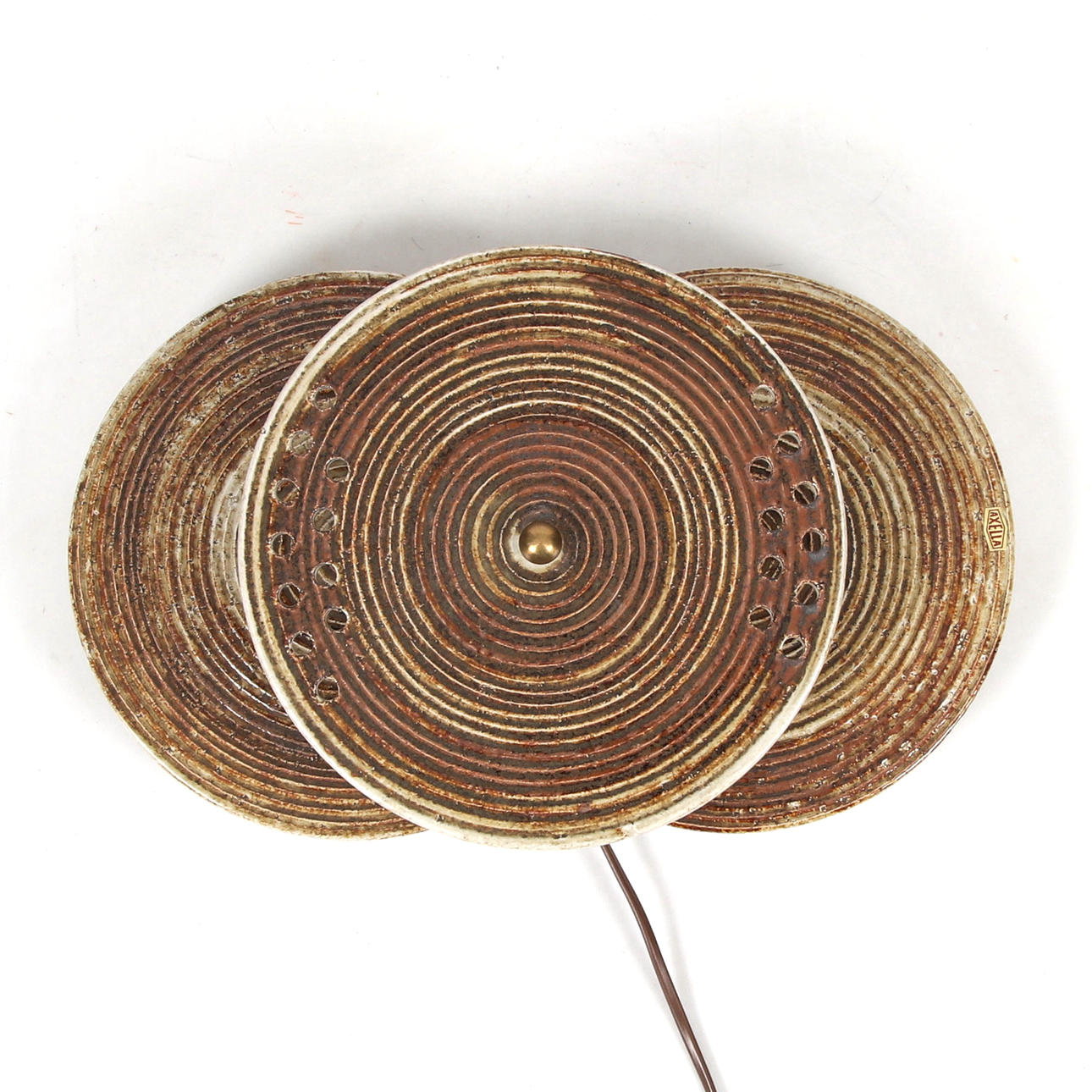 A stoneware wall lamp by Axella Denmark.