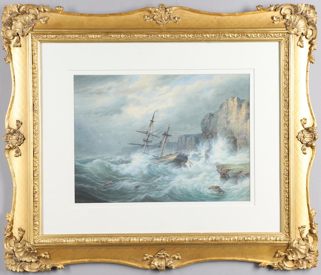 WILLIAM JOY (1803-1867). A STIFF ONSHORE BREEZE WITH A DISMASTED MERCHANTMAN FOUNDERING ON THE ROCKS.