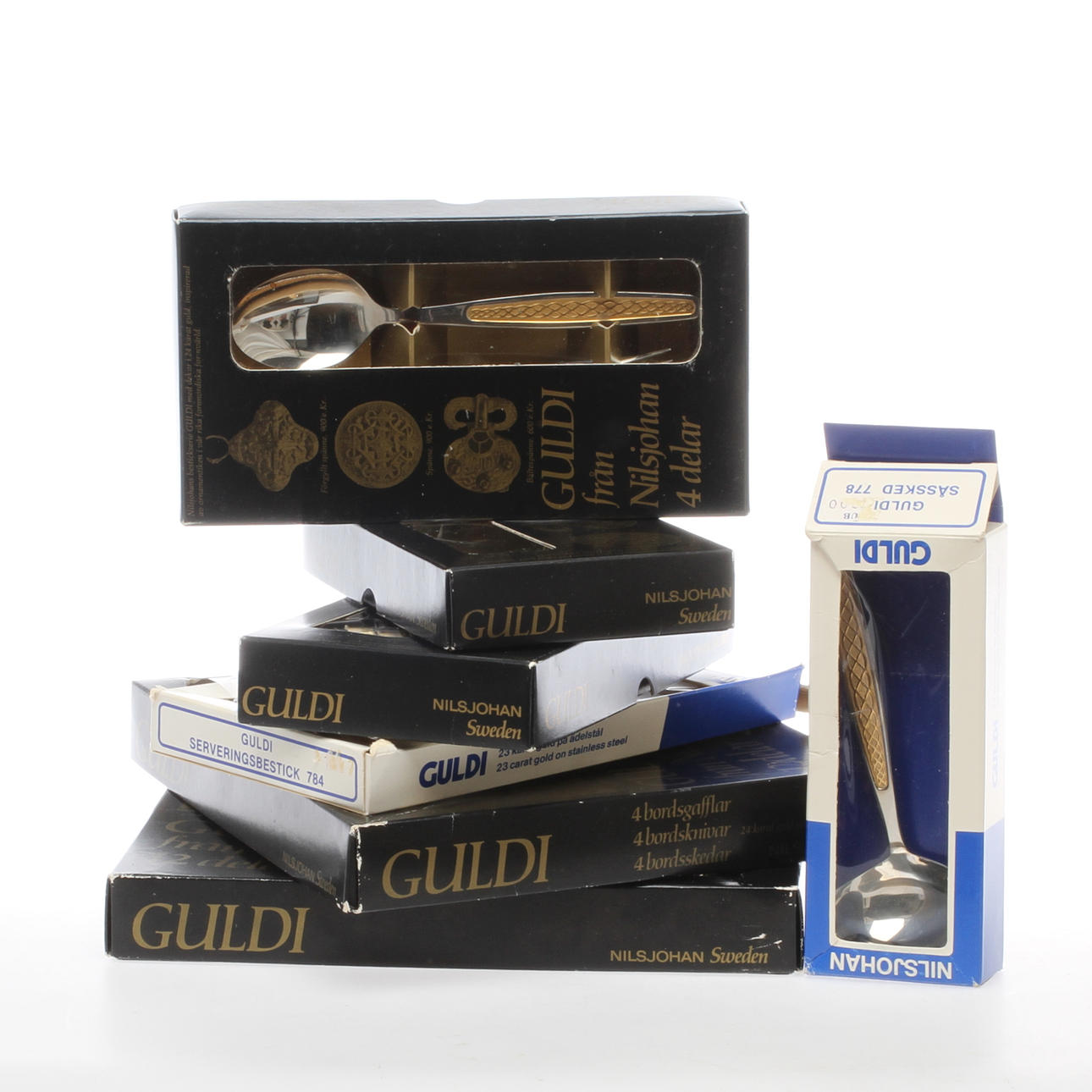 BESTICK, 34 delar "Guldi", Nilsjohan.