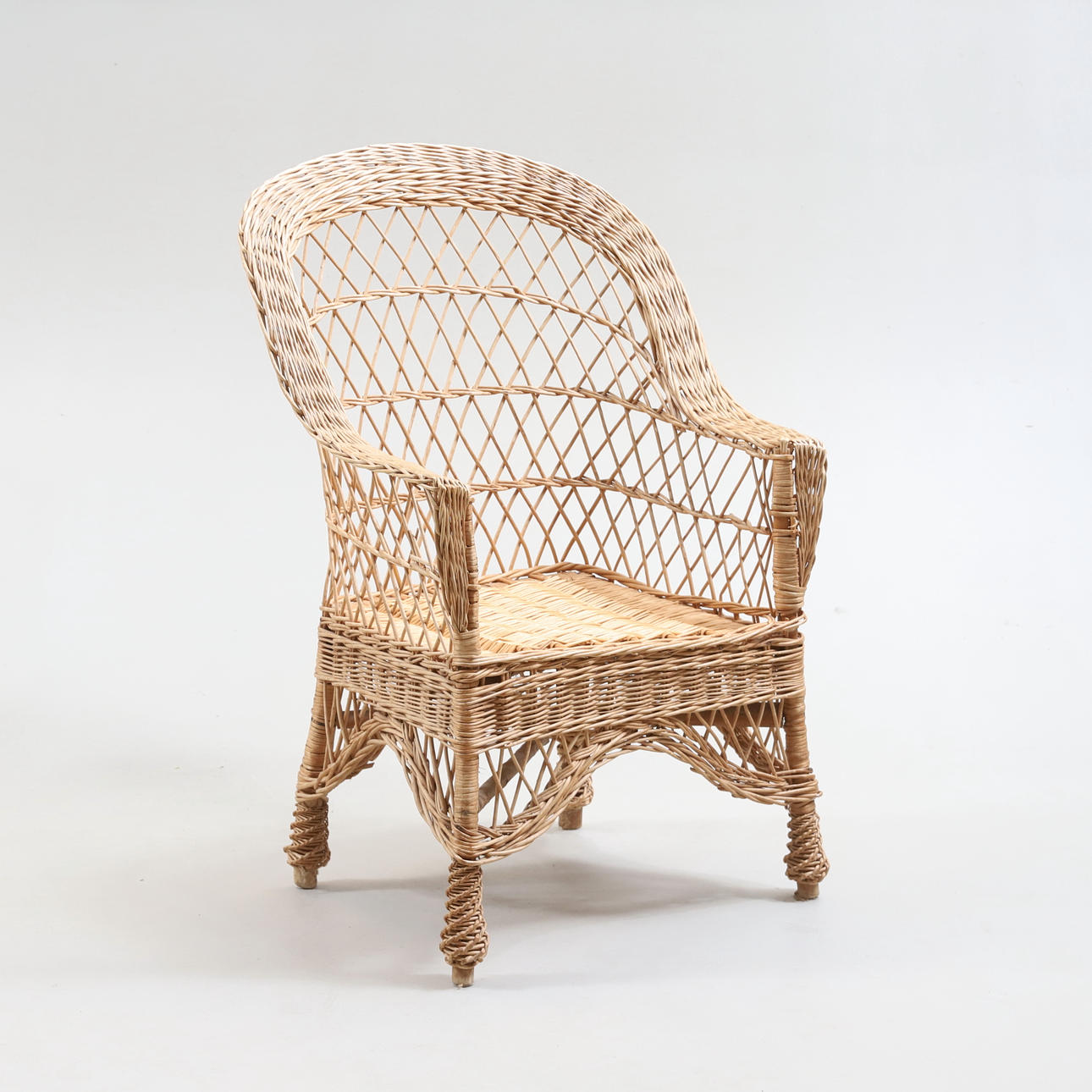 WICKER CHAIR.