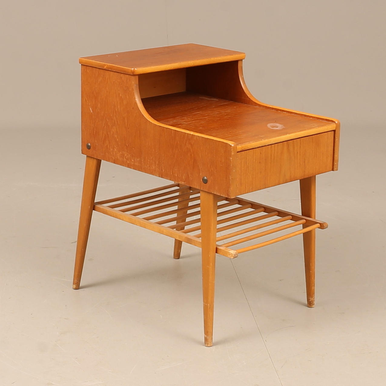 A 1960's teak bedside table.