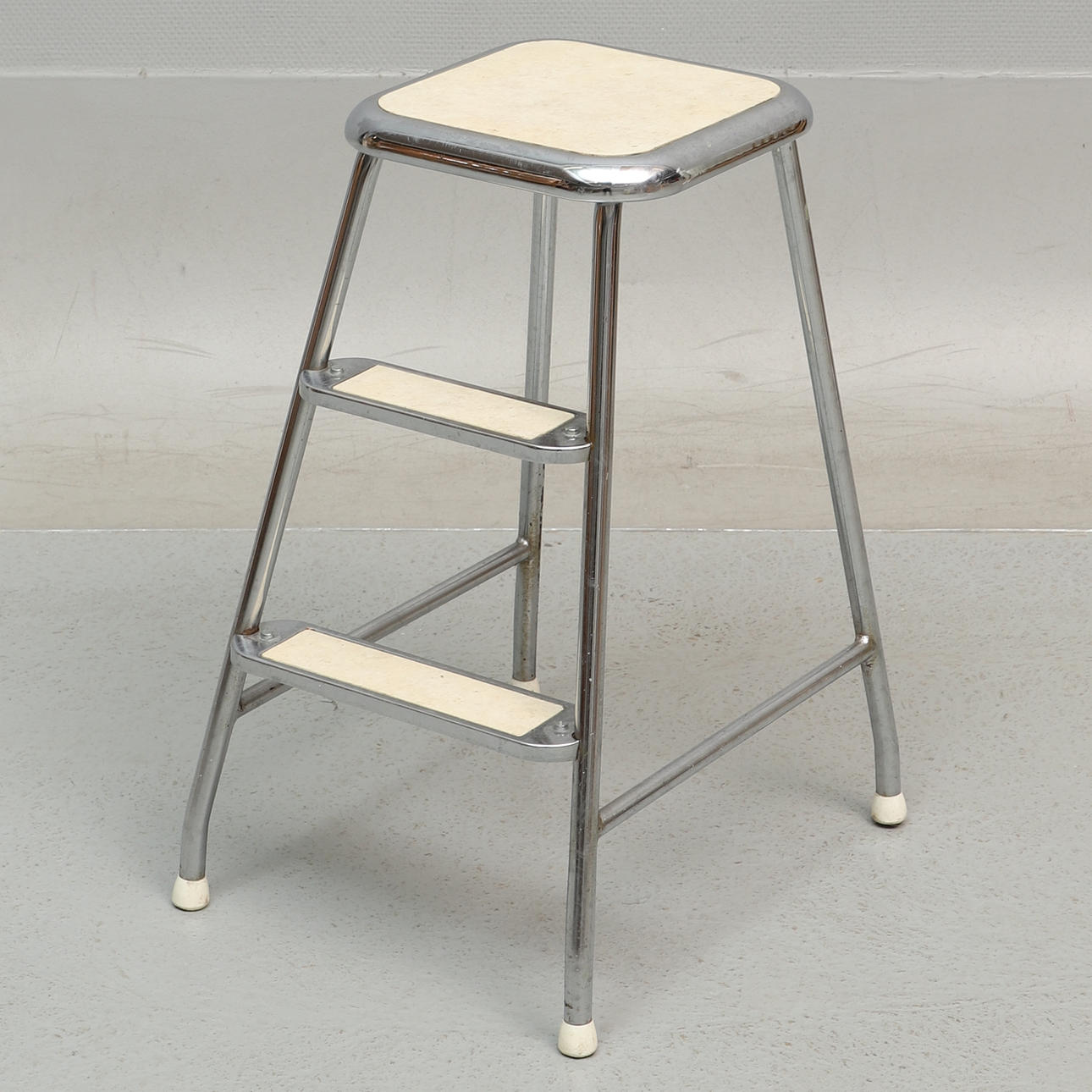 A chrome step stool, 20th century.