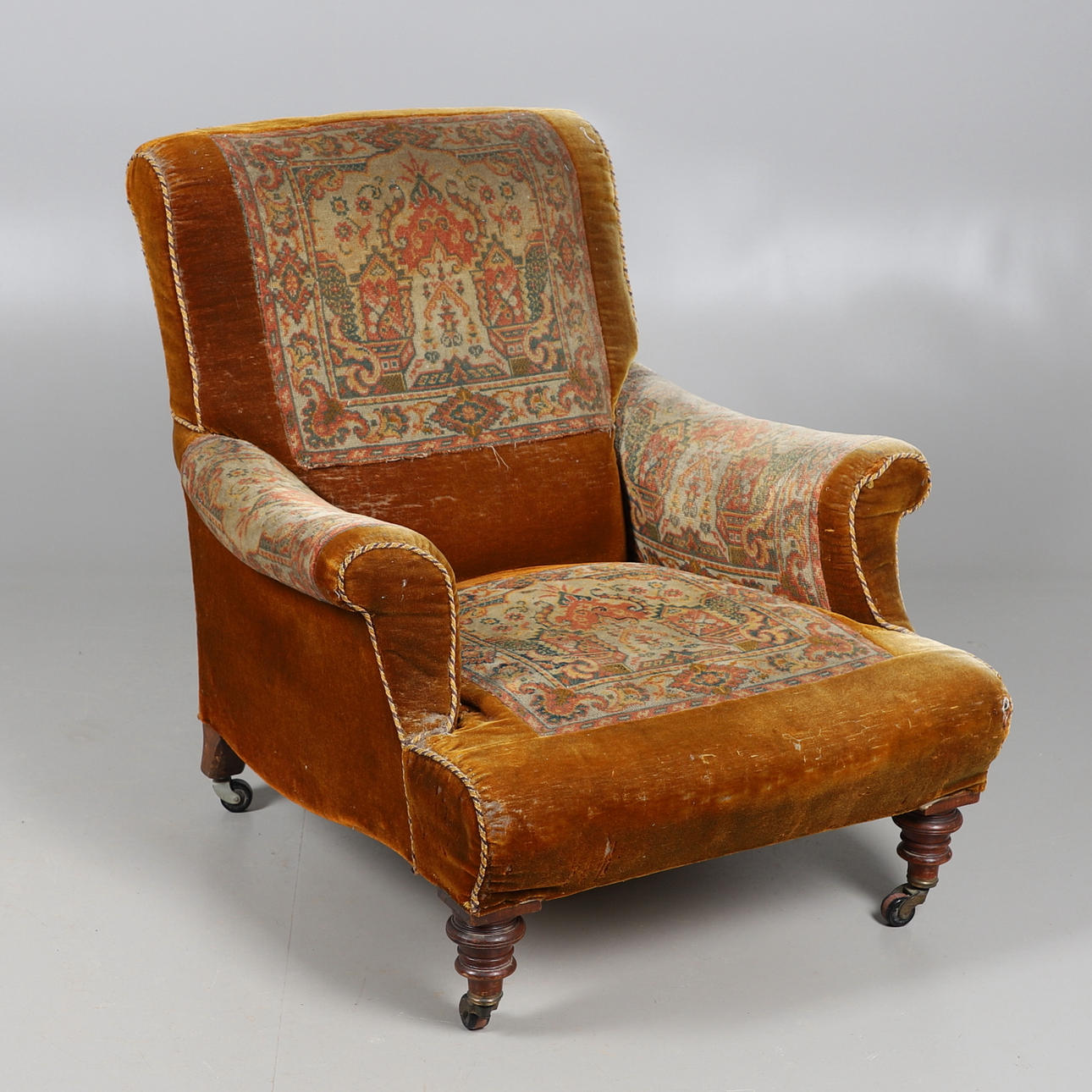 A VICTORIAN ARMCHAIR.