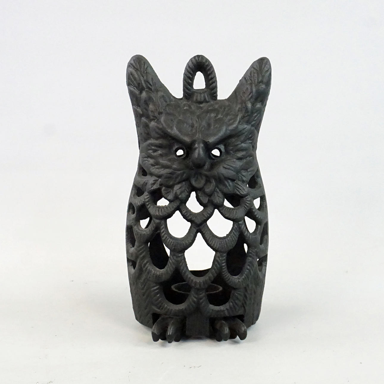 LJUSLYKTA, gjutjärn, i form av uggla.