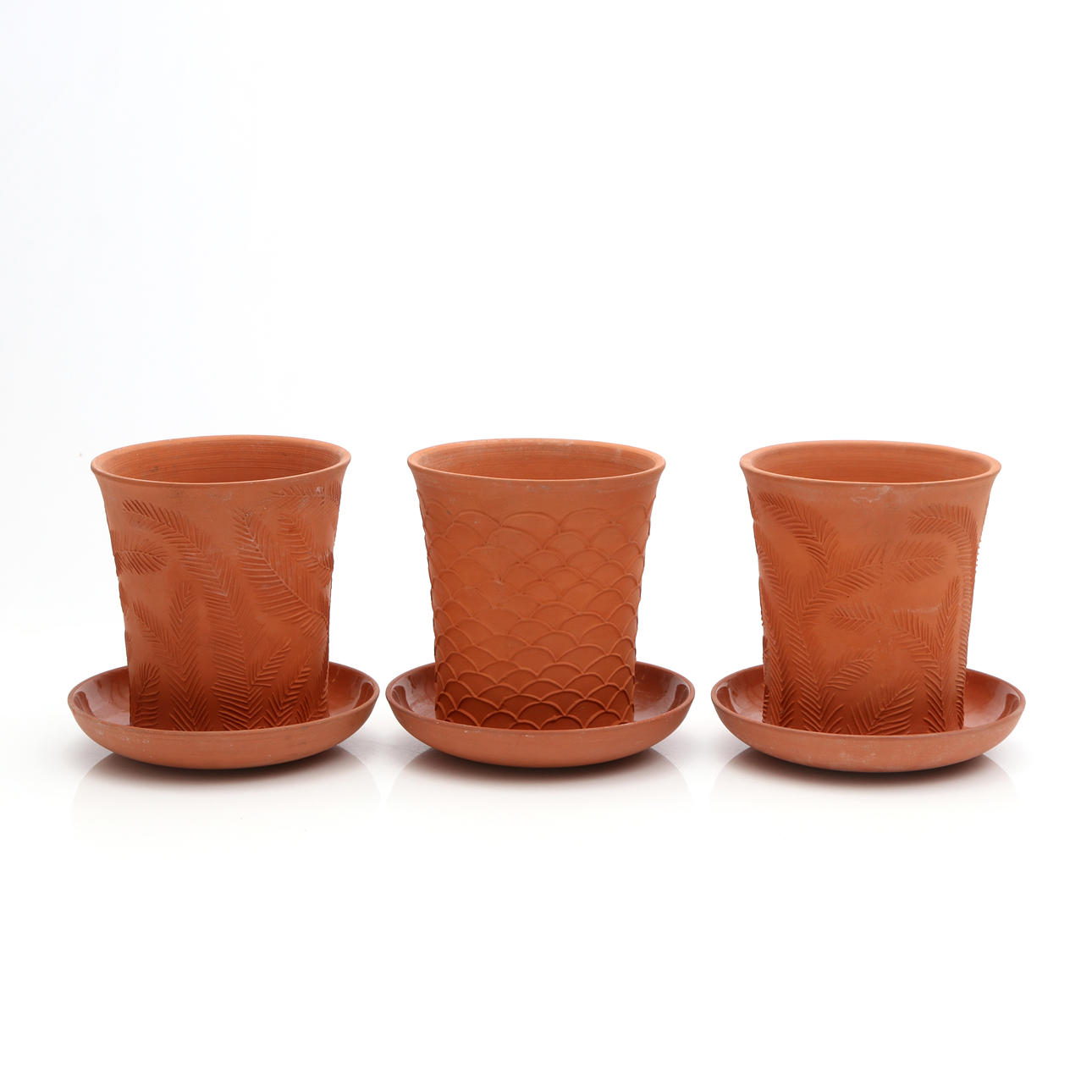 SIGNE PERSSON-MELIN. OUTER LINING WITH BARRELS, THREE PCS. Partially glazed earthenware. Nittsjö. Marked underneath.