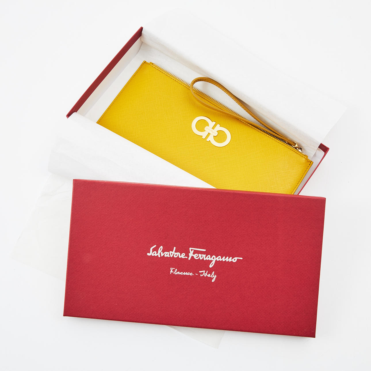 SALVATORE FERRAGAMO, "Gancini clutch".