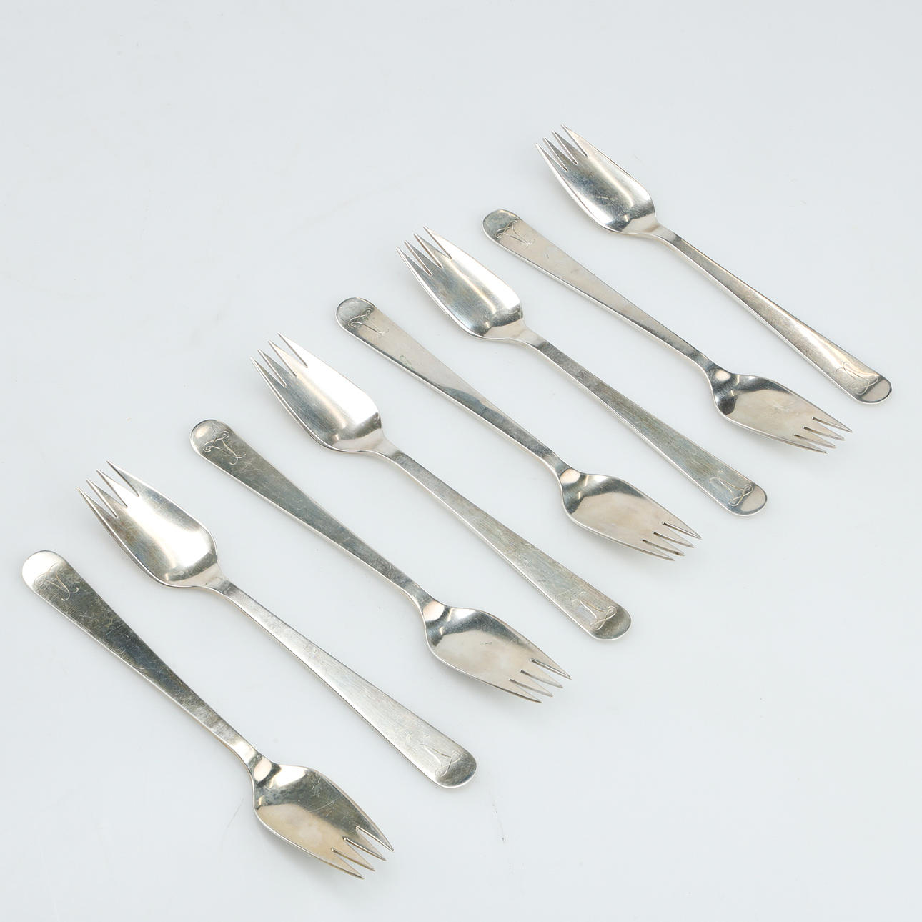 WIWEN NILSSON. 8 Klappgabeln, Silber, Lund, 1960.