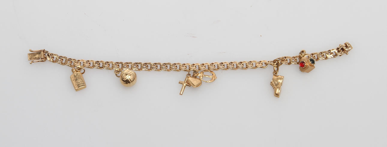 ARMLÄNK MED BERLOCKER, 18K guld.