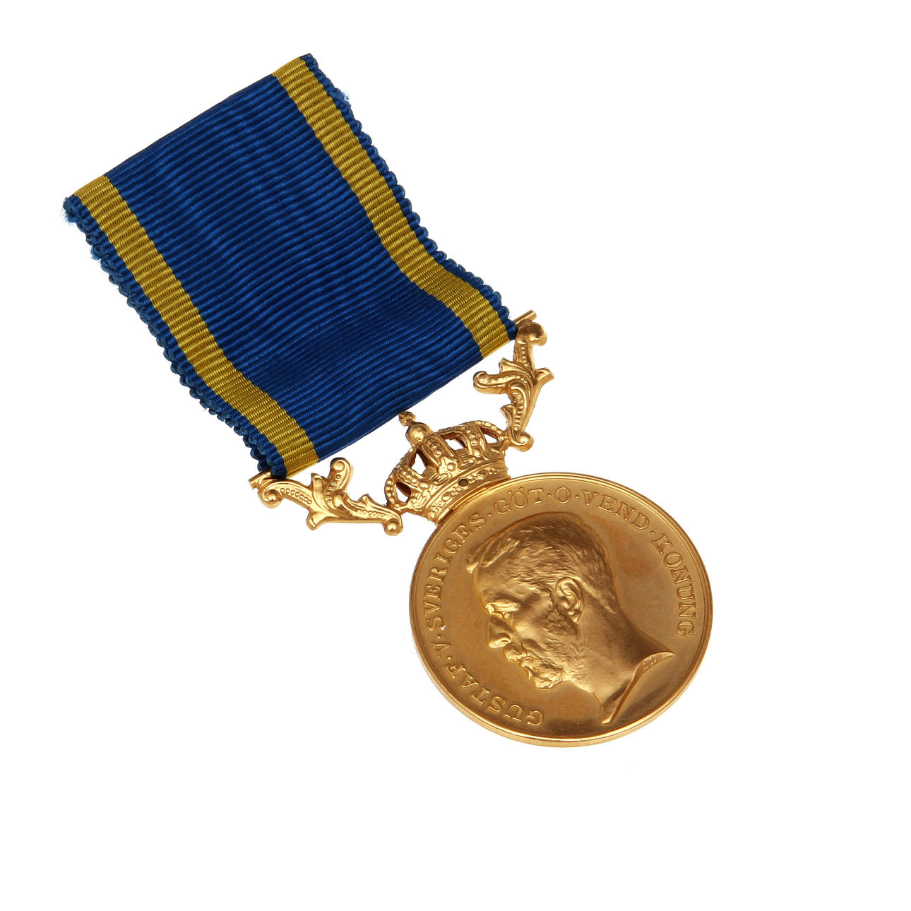 MEDALJ, guld, vikt ca 15 gram.