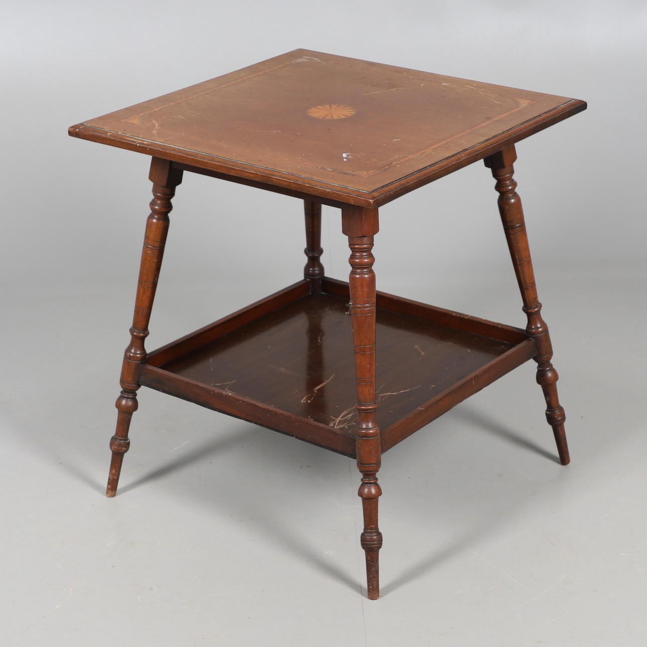 A MAHOGANY INLAID TABLE.