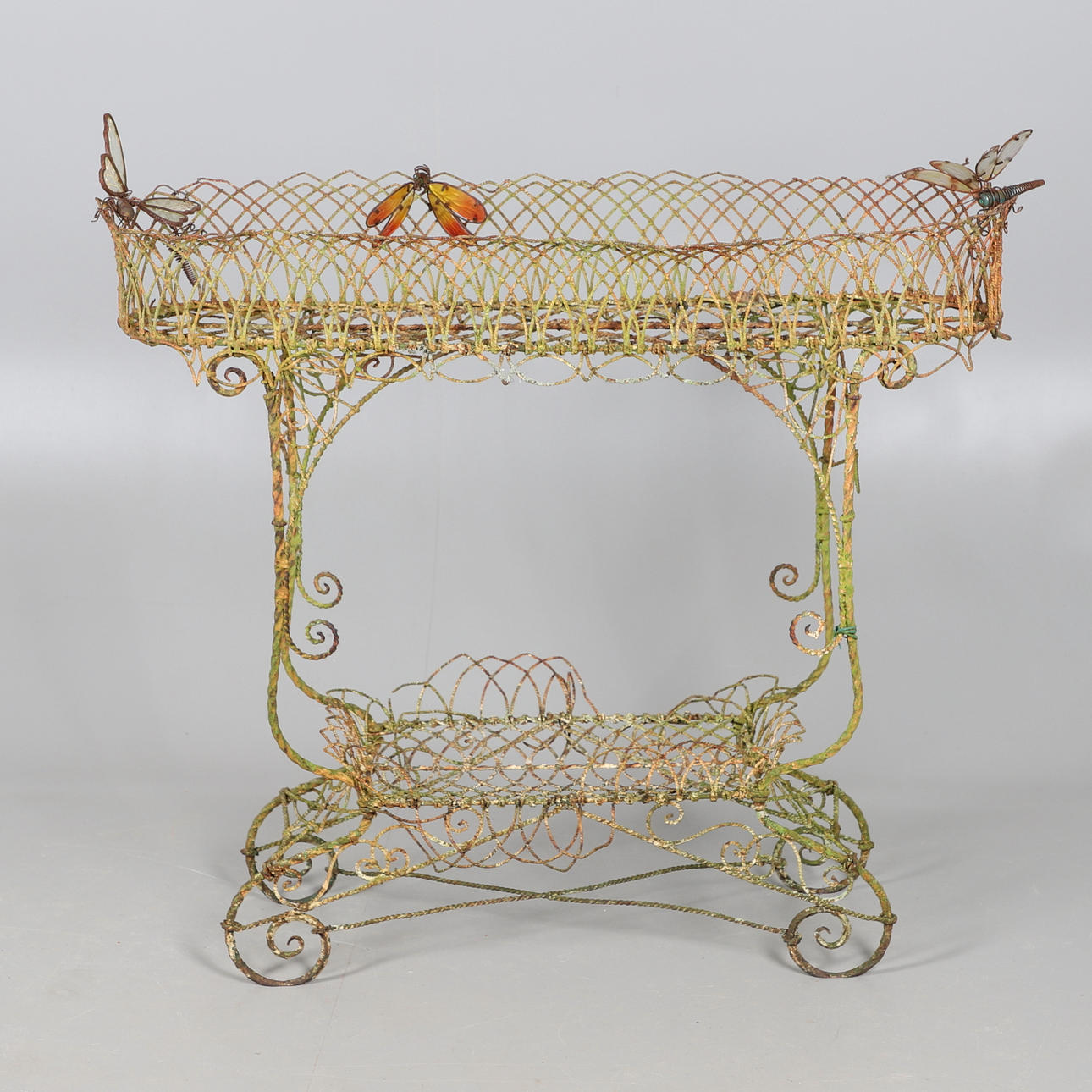 A VICTORIAN WIREWORK CONSERVATORY PLANT STAND.