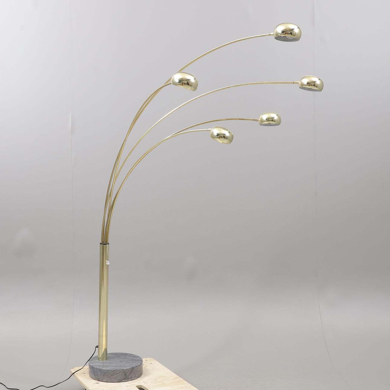 A five-armed brass floor lamp, marble base, 1980/90s.