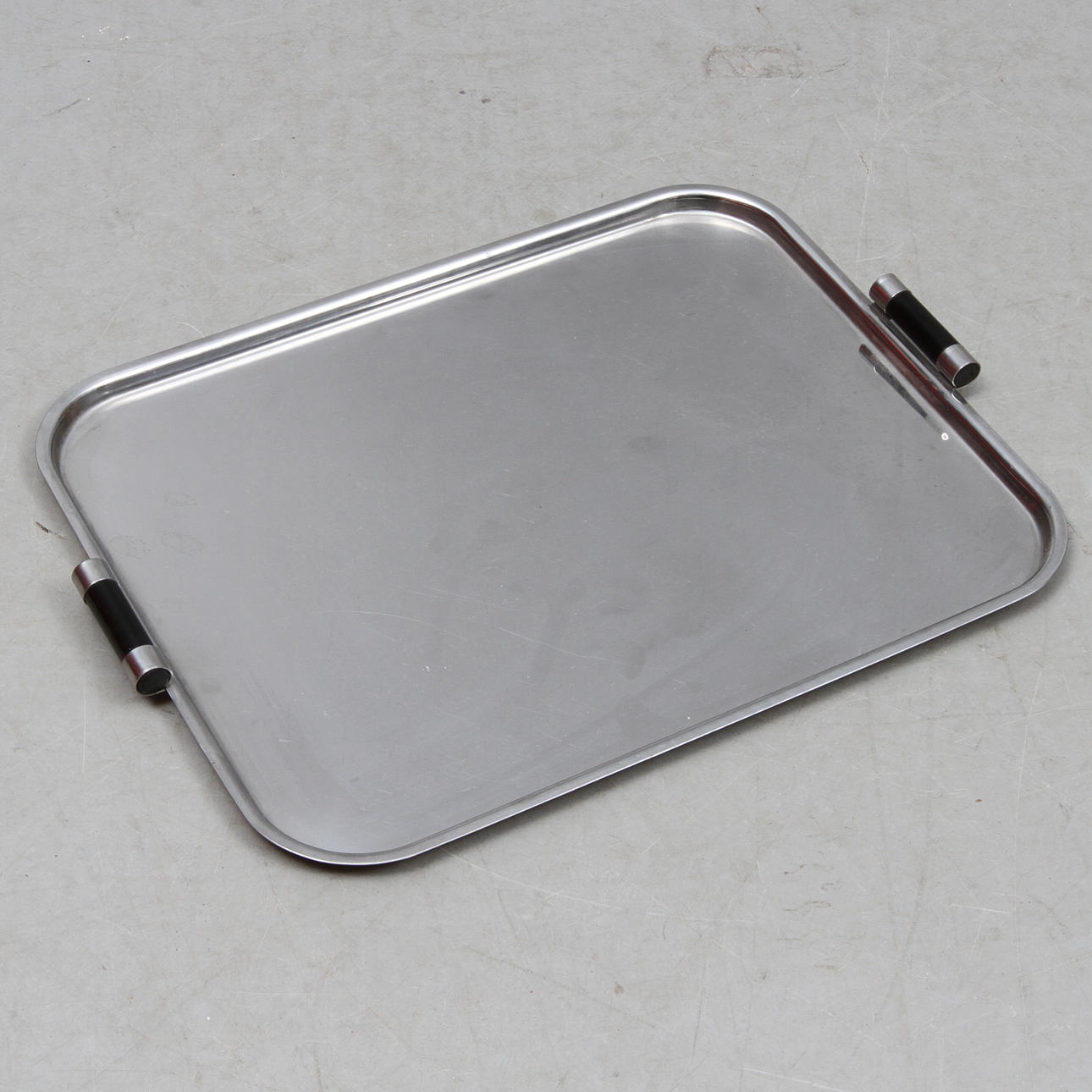 BRICKA, rostfritt stål, Pressbolaget Eskilstuna, 1900-talets första hälft.