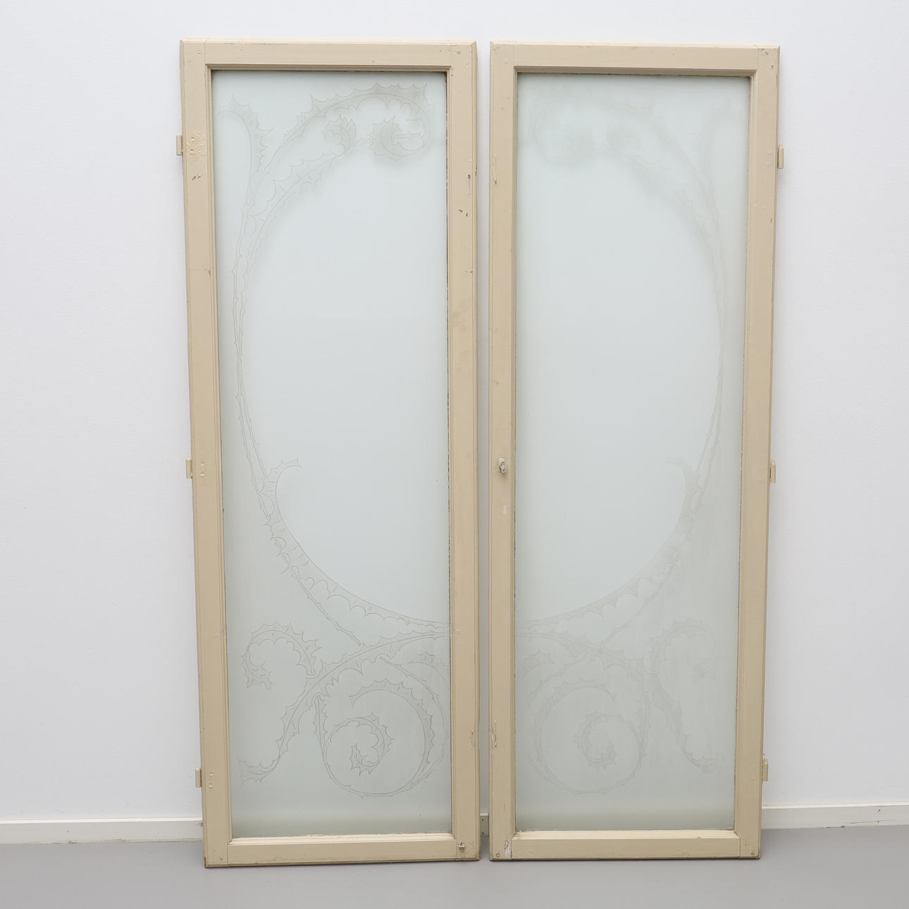 Art Nouveau windows, a pair with etched decor.